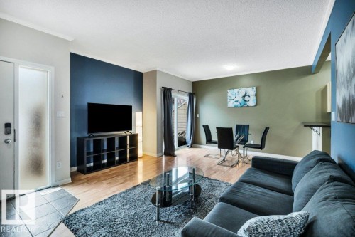 64 3040 Spence Wynd, Edmonton, AB - Indoor Photo Showing Living Room