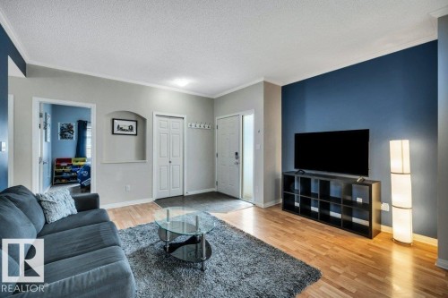 64 3040 Spence Wynd, Edmonton, AB - Indoor Photo Showing Living Room
