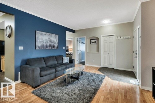64 3040 Spence Wynd, Edmonton, AB - Indoor Photo Showing Living Room