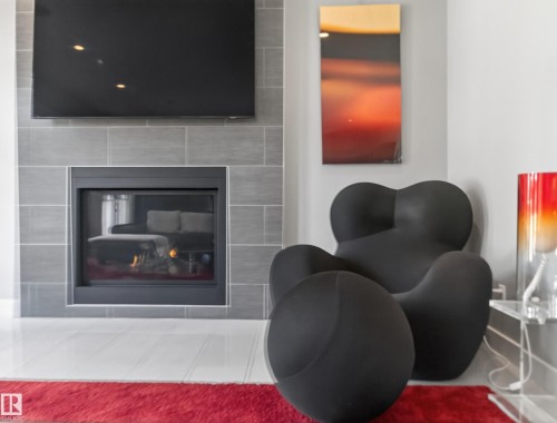 10650 66 Avenue, Edmonton, AB - Indoor Photo Showing Living Room With Fireplace