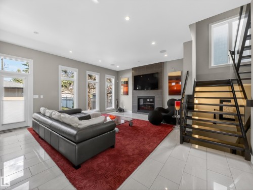 10650 66 Avenue, Edmonton, AB - Indoor Photo Showing Other Room With Fireplace