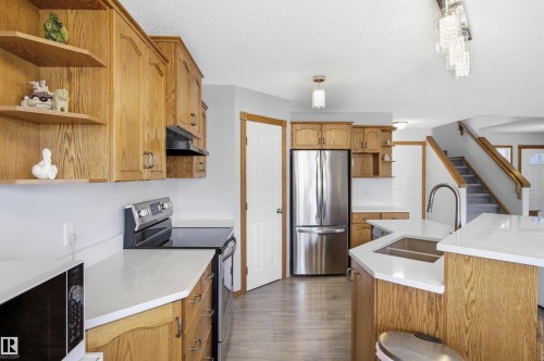 6014 48 Avenue, Beaumont, AB - Indoor Photo Showing Kitchen With Double Sink