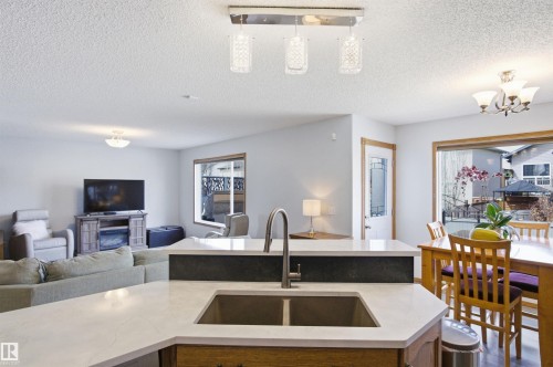 6014 48 Avenue, Beaumont, AB - Indoor Photo Showing Kitchen With Stainless Steel Kitchen With Double Sink With Upgraded Kitchen