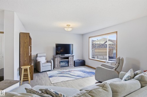 6014 48 Avenue, Beaumont, AB - Indoor Photo Showing Living Room