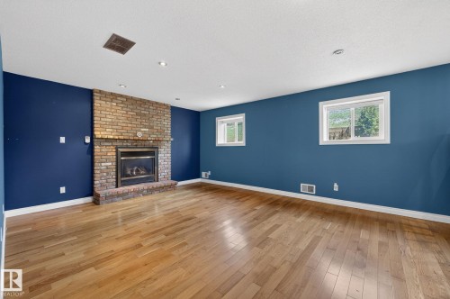 4 Dorset Place, St. Albert, AB - Indoor Photo Showing Living Room With Fireplace