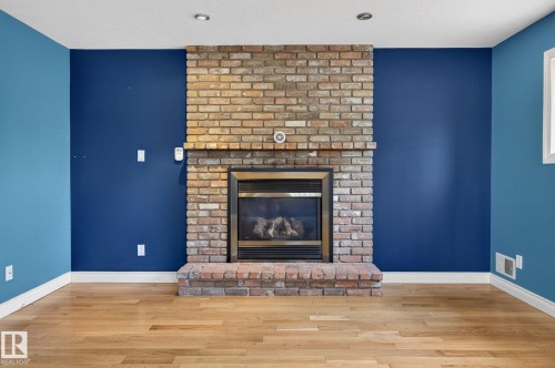 4 Dorset Place, St. Albert, AB - Indoor Photo Showing Living Room With Fireplace