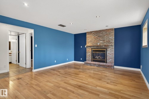 4 Dorset Place, St. Albert, AB - Indoor Photo Showing Living Room With Fireplace