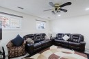 Spacious room featuring light-toned walls, recessed lighting, and a ceiling fan with integrated illumination - 236 Lago Lindo Crescent, Edmonton, AB  - Indoor Photo Showing Living Room 
