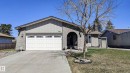 Stucco exterior with a peaked roofline and front-facing gabled section - 3311 108 Street, Edmonton, AB  - Outdoor 
