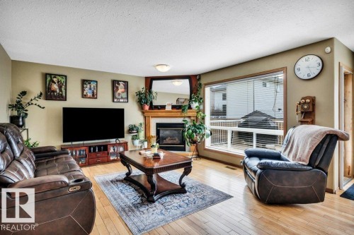 5 Hayden Place, St. Albert, AB - Indoor Photo Showing Living Room With Fireplace