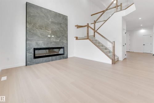 138 Creekside Lane Lane, Leduc, AB - Indoor With Fireplace