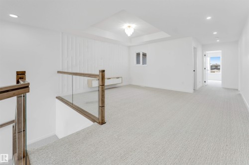 138 Creekside Lane Lane, Leduc, AB - Indoor Photo Showing Other Room