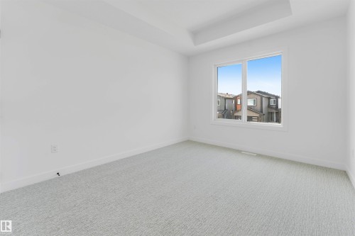 138 Creekside Lane Lane, Leduc, AB - Indoor Photo Showing Other Room