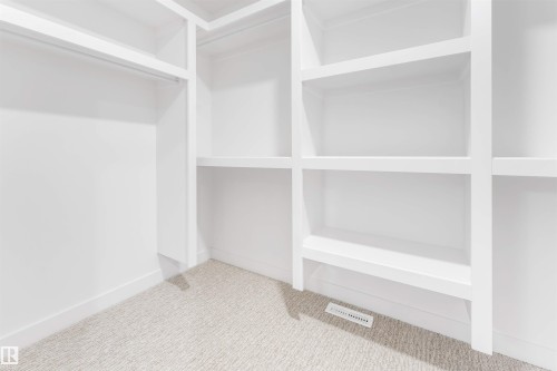 138 Creekside Lane Lane, Leduc, AB - Indoor With Storage