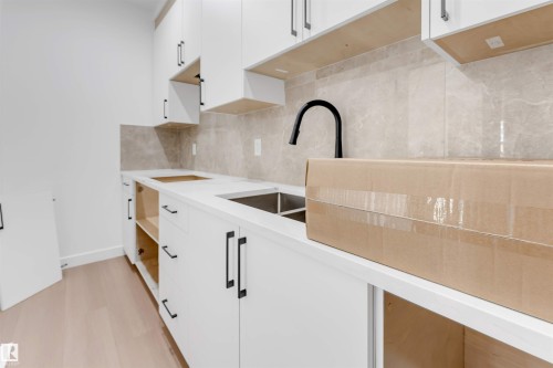 138 Creekside Lane Lane, Leduc, AB - Indoor Photo Showing Kitchen With Double Sink