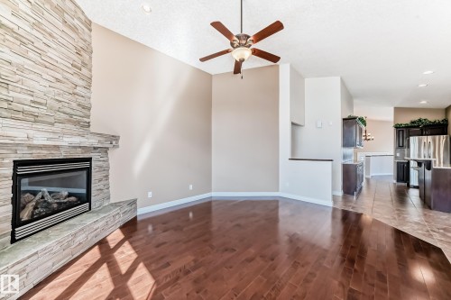 1221 Cunningham Drive, Edmonton, AB - Indoor Photo Showing Living Room With Fireplace