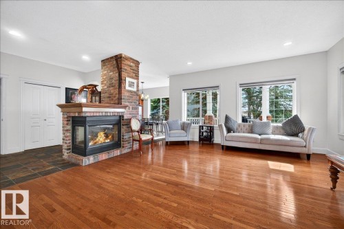 1251 Summerside Drive, Edmonton, AB - Indoor Photo Showing Living Room With Fireplace