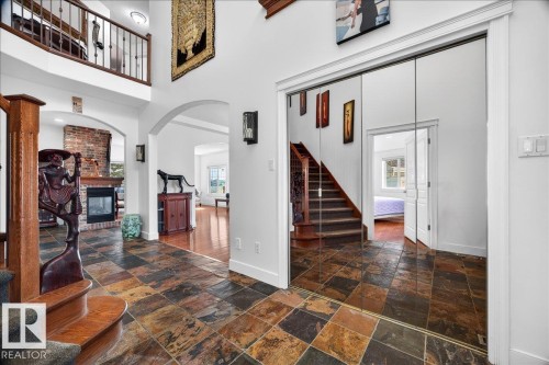 1251 Summerside Drive, Edmonton, AB - Indoor Photo Showing Other Room With Fireplace