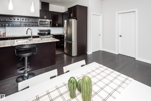 404 10238 103 Street, Edmonton, AB - Indoor Photo Showing Kitchen With Stainless Steel Kitchen With Double Sink