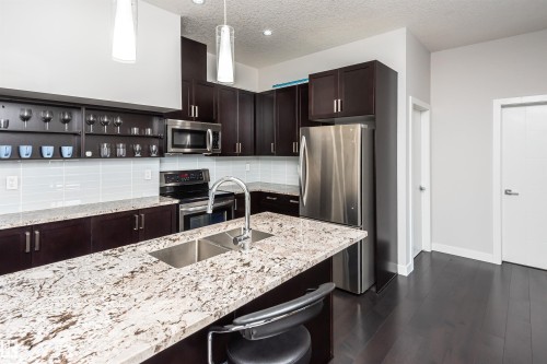 404 10238 103 Street, Edmonton, AB - Indoor Photo Showing Kitchen With Stainless Steel Kitchen With Double Sink With Upgraded Kitchen