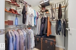 Customizable wire shelving system with multiple storage rods and overhead shelving - 