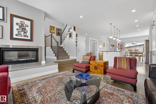 9052 92 Street, Edmonton, AB - Indoor Photo Showing Living Room With Fireplace
