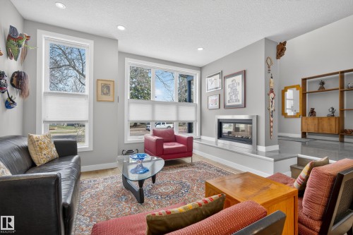 9052 92 Street, Edmonton, AB - Indoor Photo Showing Living Room With Fireplace