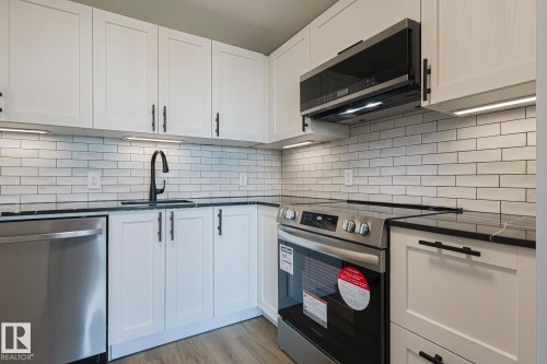 505 10149 Saskatchewan Drive, Edmonton, AB - Indoor Photo Showing Kitchen With Stainless Steel Kitchen With Upgraded Kitchen