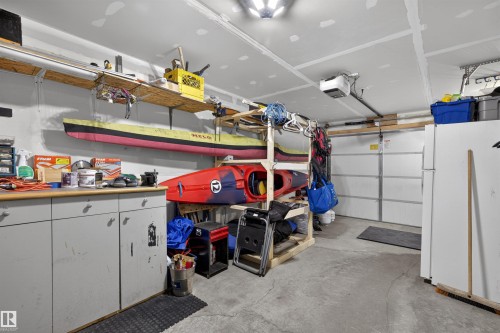 8 2560 Pegasus Boulevard, Edmonton, AB - Indoor Photo Showing Garage