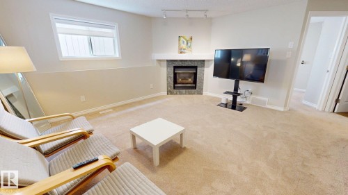 2078 Tanner Wynd, Edmonton, AB - Indoor Photo Showing Living Room With Fireplace