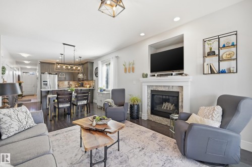 77 Richmond Link, Fort Saskatchewan, AB - Indoor Photo Showing Living Room With Fireplace