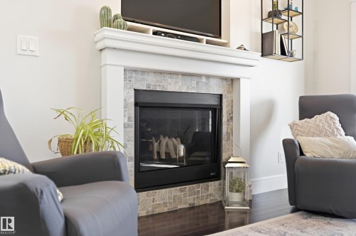 77 Richmond Link, Fort Saskatchewan, AB - Indoor Photo Showing Living Room With Fireplace