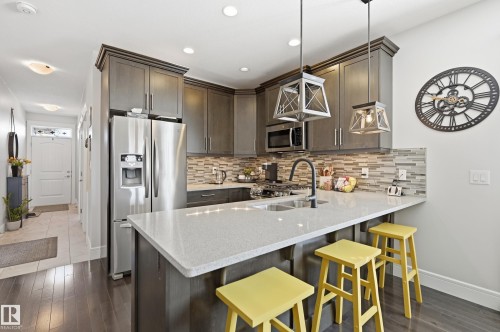 77 Richmond Link, Fort Saskatchewan, AB - Indoor Photo Showing Kitchen With Double Sink With Upgraded Kitchen