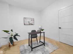Light wood-finish flooring in a herringbone pattern - 