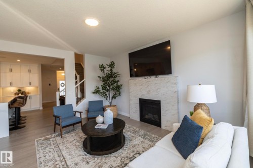 1448 Darby Green Green, Edmonton, AB - Indoor With Fireplace