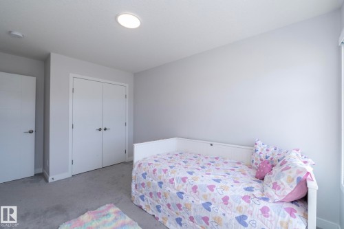 Neutral tone wall finishes - 1448 Darby Green Green, Edmonton, AB - Indoor Photo Showing Bedroom
