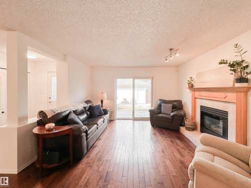 10020 97 Avenue, Edmonton, AB - Indoor Photo Showing Living Room With Fireplace