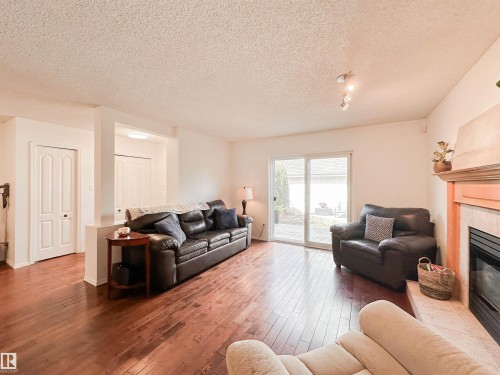 10020 97 Avenue, Edmonton, AB - Indoor Photo Showing Living Room With Fireplace