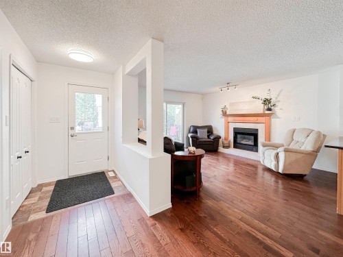 10020 97 Avenue, Edmonton, AB - Indoor Photo Showing Living Room With Fireplace