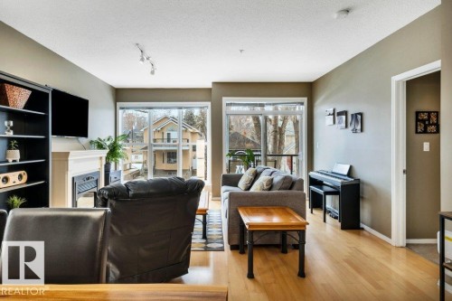 201 11025 83 Avenue, Edmonton, AB - Indoor Photo Showing Living Room