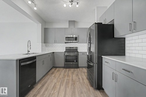 3423 Checknita Terrace, Edmonton, AB - Indoor Photo Showing Kitchen With Stainless Steel Kitchen With Upgraded Kitchen
