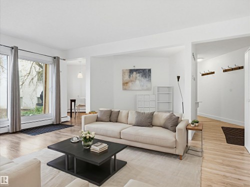 108 5730 Riverbend Road, Edmonton, AB - Indoor Photo Showing Living Room