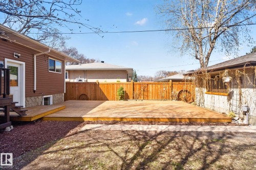 Spacious outdoor deck featuring natural wood planks - 10409 83 Street, Edmonton, AB - Outdoor With Deck Patio Veranda