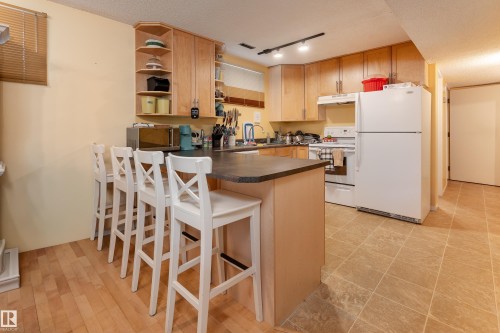 Second kitchen in basement with private entrance, 2 bedrooms, 4 pc bath and living/dining area - 10956 81 Avenue, Edmonton, AB - Indoor Photo Showing Kitchen