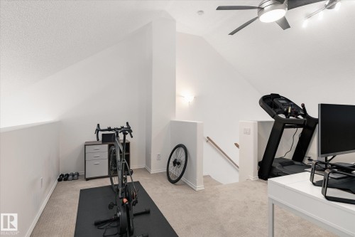 21 10235 111 Street, Edmonton, AB - Indoor Photo Showing Gym Room