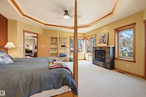 9212 118 Street, Edmonton, AB - Indoor Photo Showing Bedroom With Fireplace