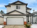 The property features a two-story exterior with light-colored siding and dark trim accents - 308 Beringer Crescent, Edmonton, AB  - Outdoor 