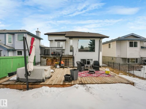 The property features a spacious rear deck, ideal for outdoor enjoyment - 308 Beringer Crescent, Edmonton, AB - Outdoor With Deck Patio Veranda With Exterior