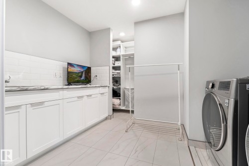4412 Wingfield Cape, Edmonton, AB - Indoor Photo Showing Laundry Room