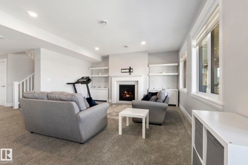 4412 Wingfield Cape, Edmonton, AB - Indoor With Fireplace